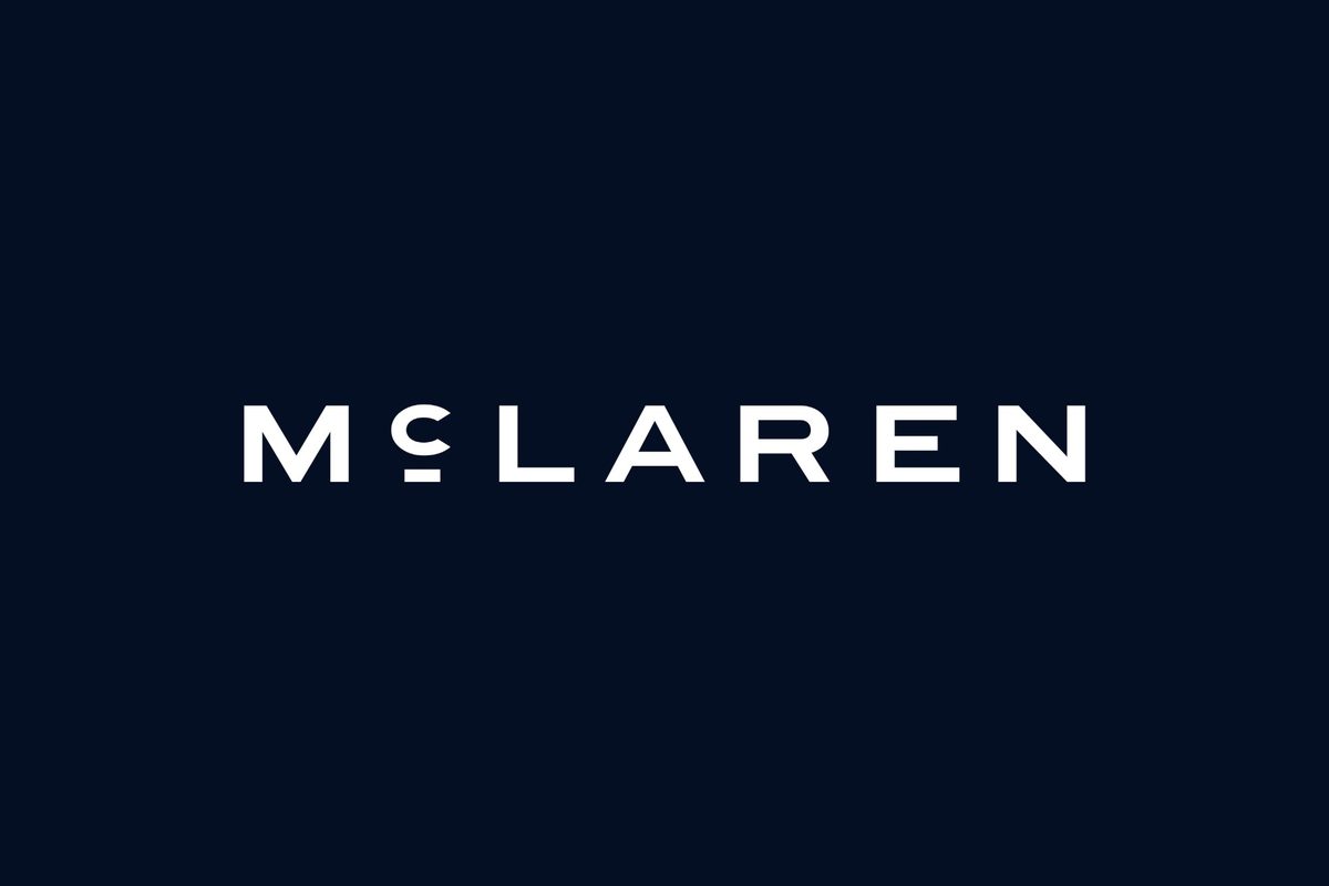 The new McLaren wordmark in white on navy